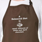 A Balanced Diet Is Equal Amounts Of White & Dark Chocolate - Apron